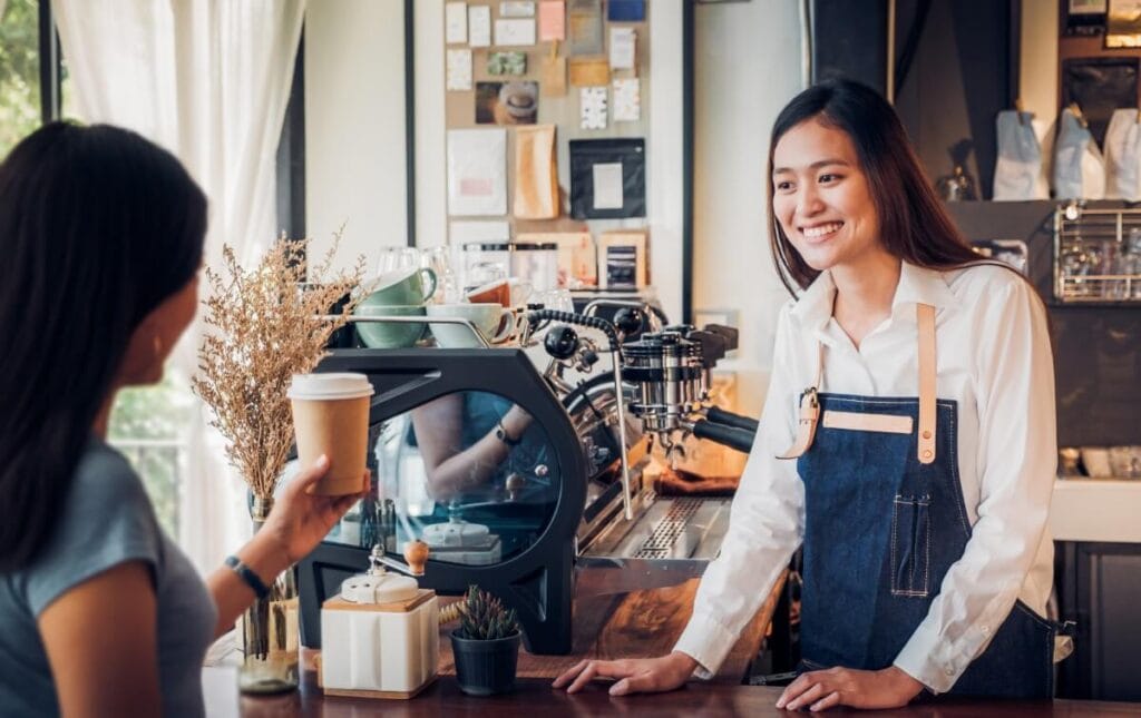 international female student working part time to help her finance her study abroad education